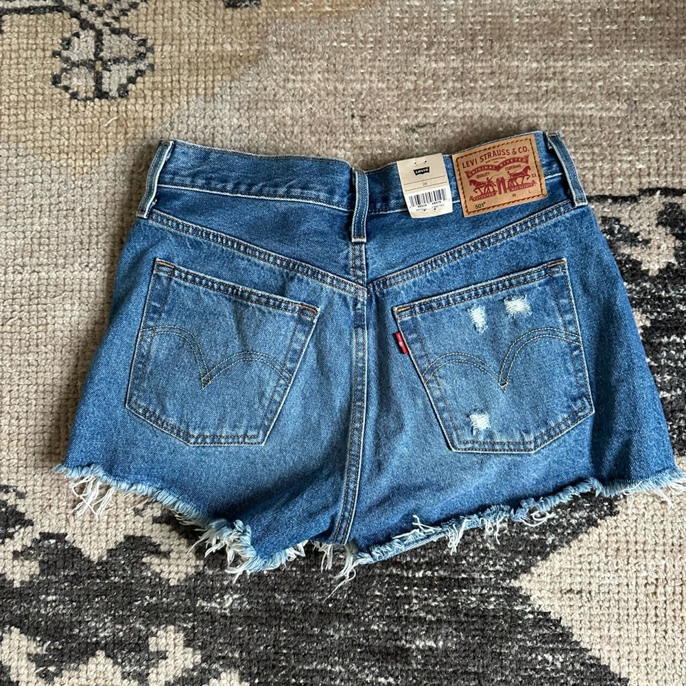 Levi's 501 Blue Jean Shorts with Frayed Hem and Distressed Details